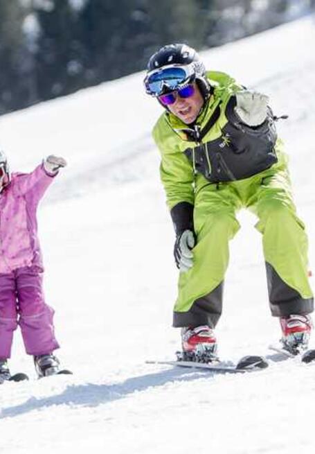 ski instructor and kids