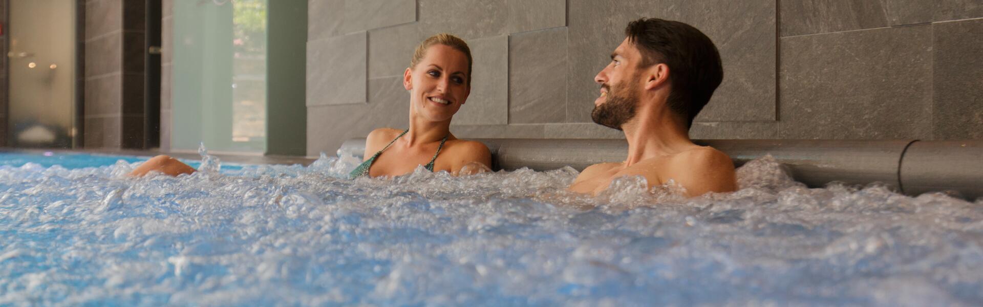 couple in the indoor pool