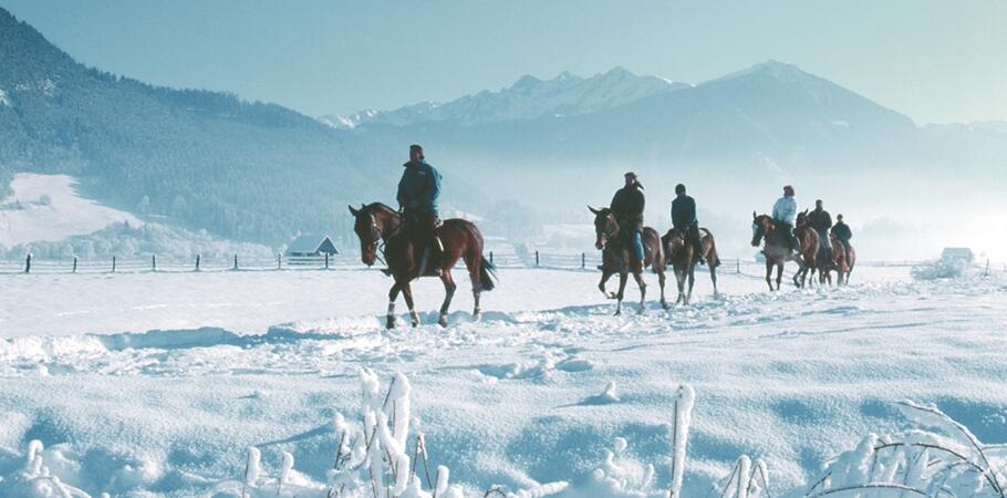 horse riding in winter in Kaprun