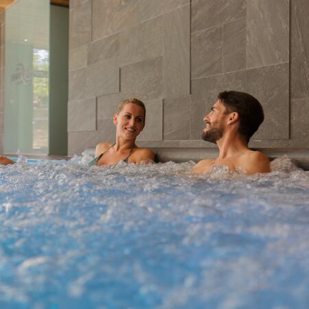 couple in the indoor pool